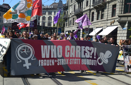 Striscione al corteo del 1o Maggio a Zurigo: Who cares?