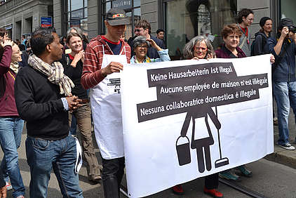 Manifestant-e-s pour les droits des employé-e-s de maison (le 1er mai, à Zurich)