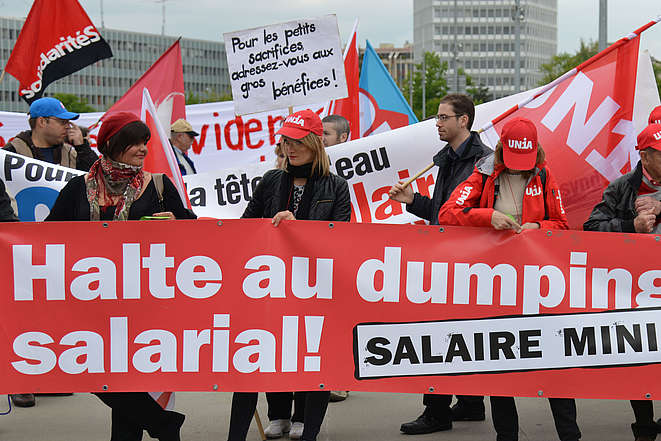 Banderole: Halte au dumping salarial!